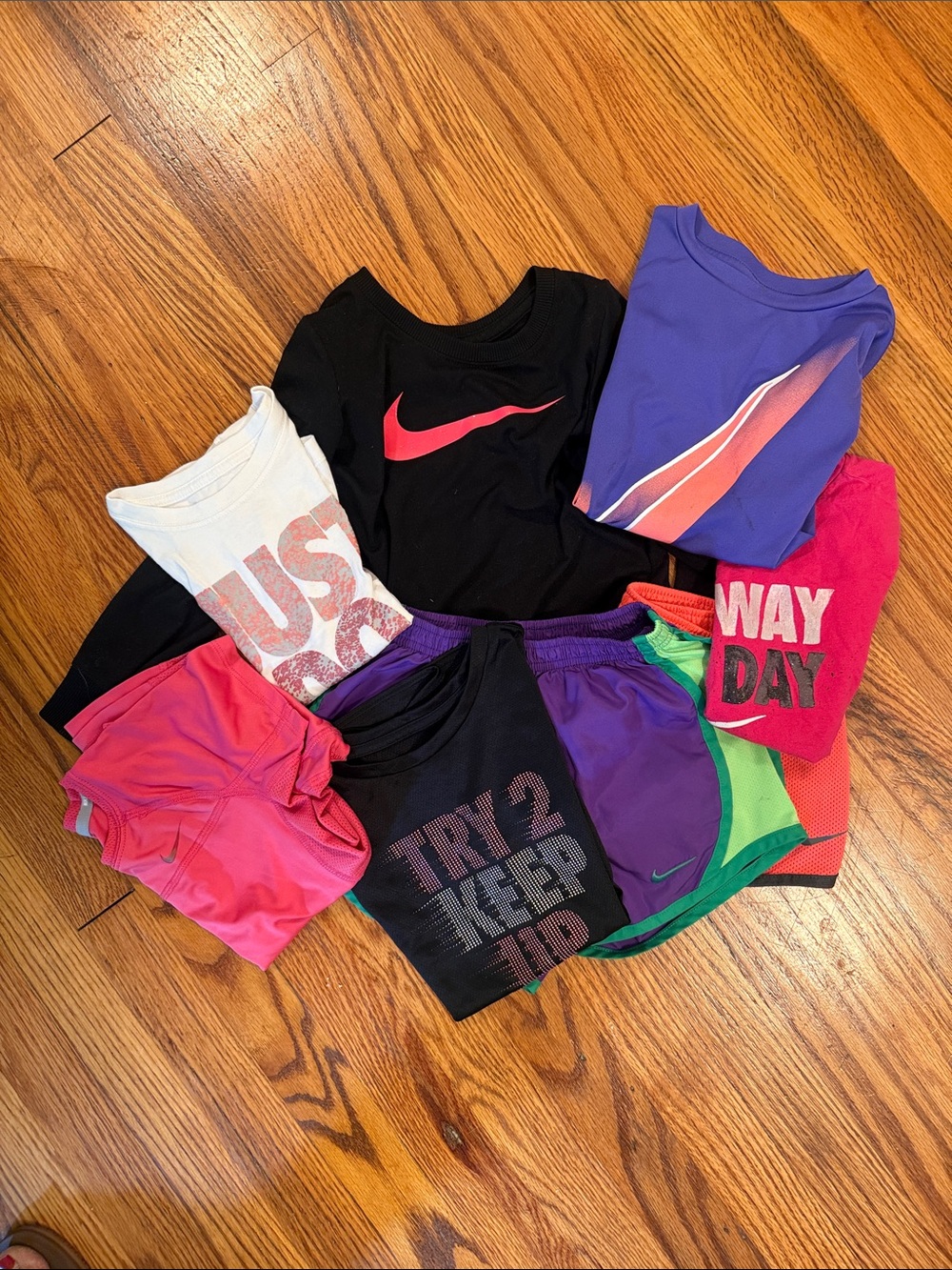 Nike Lot Kids Black Tee with Pink Swoosh and Colorful Active Mix